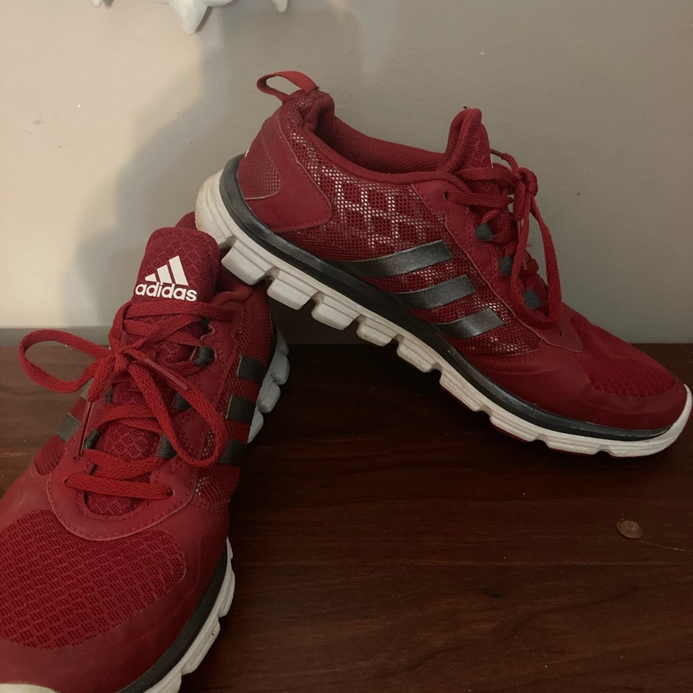 Men’s red adidas sneakers